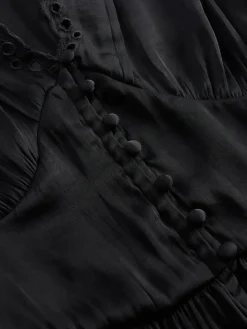 Eyelet V-Neck Peplum Top
