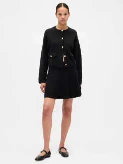 Pleated Mini Sweater Skirt